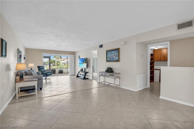 living room featuring light tile patterned floors