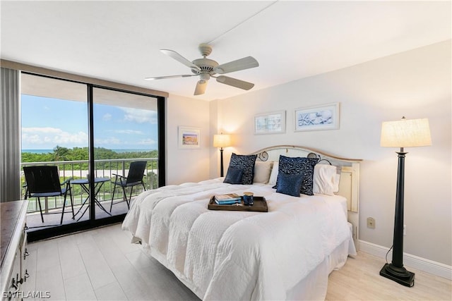 bedroom with access to outside, ceiling fan, and light hardwood / wood-style flooring