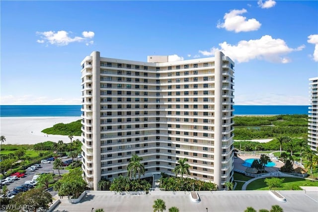 view of building exterior featuring a water view