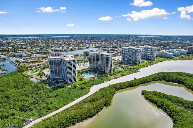 birds eye view of property featuring a water view