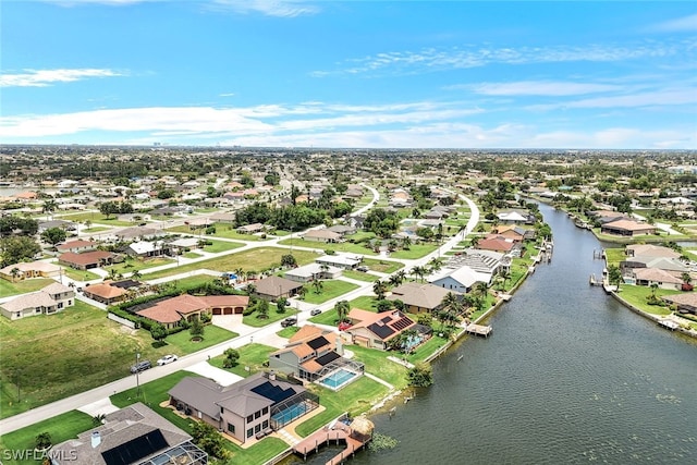 aerial view featuring a water view and a residential view