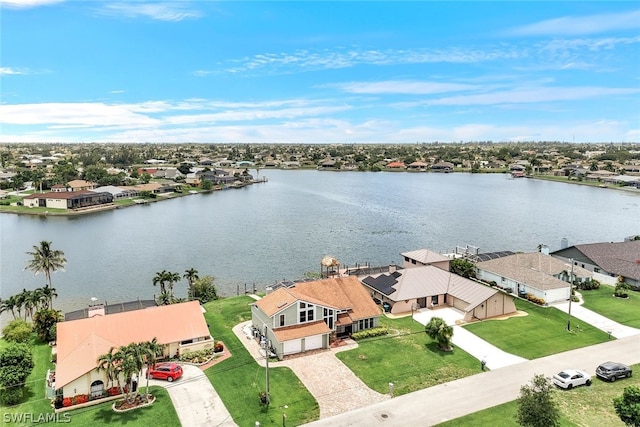 aerial view with a water view and a residential view