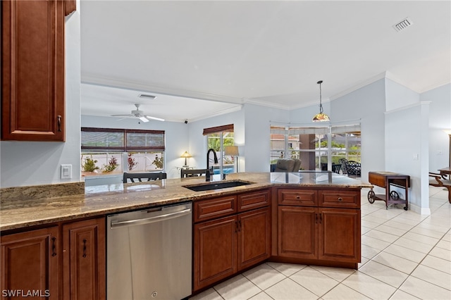 kitchen featuring sink, plenty of natural light, stainless steel dishwasher, and ornamental molding