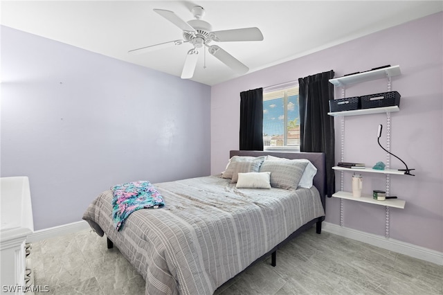 bedroom with hardwood / wood-style flooring and ceiling fan