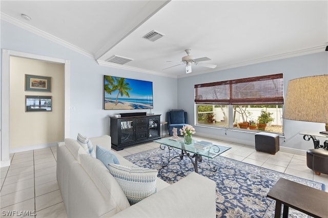 tiled living room featuring vaulted ceiling, ornamental molding, and ceiling fan