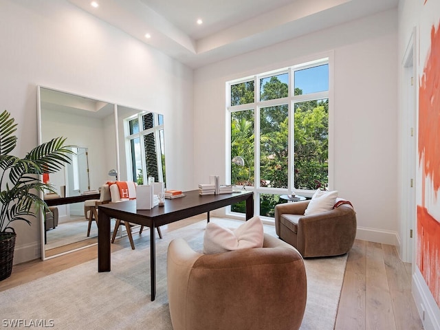 office space with light hardwood / wood-style flooring