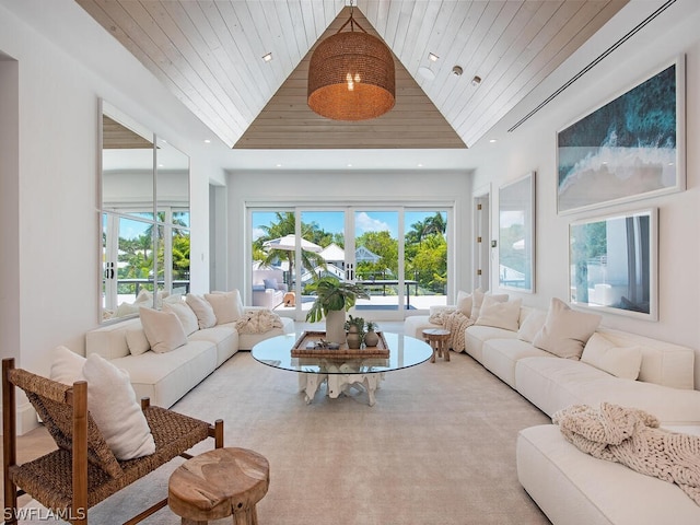 living room featuring high vaulted ceiling and wood ceiling