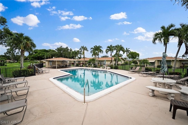 view of swimming pool featuring a patio