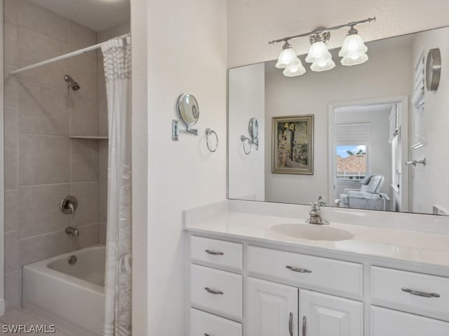 bathroom featuring vanity and shower / tub combo