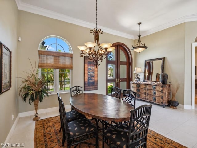 tiled dining area featuring a chandelier and crown molding