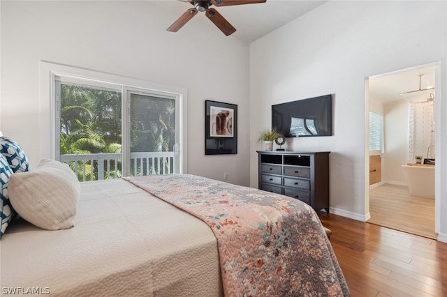 bedroom with hardwood / wood-style flooring, access to outside, multiple windows, and ceiling fan