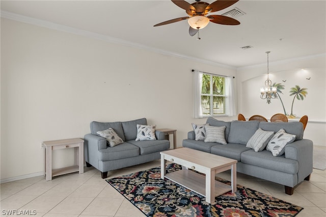 tiled living room featuring ceiling fan with notable chandelier and crown molding