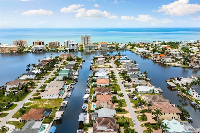 bird's eye view with a water view