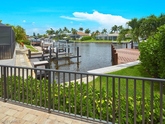 view of dock featuring a water view and boat lift