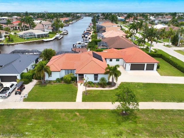 drone / aerial view with a water view