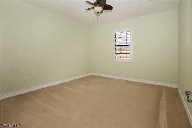 carpeted empty room with ceiling fan