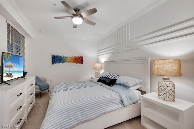 bedroom with ceiling fan, ornamental molding, and light colored carpet