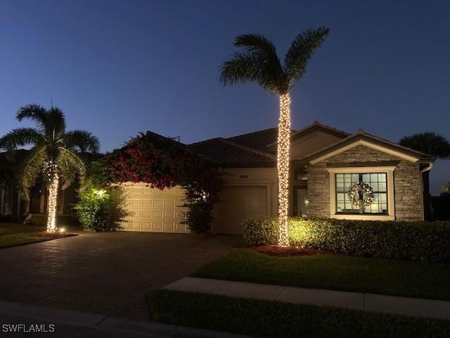 view of front of property featuring a garage