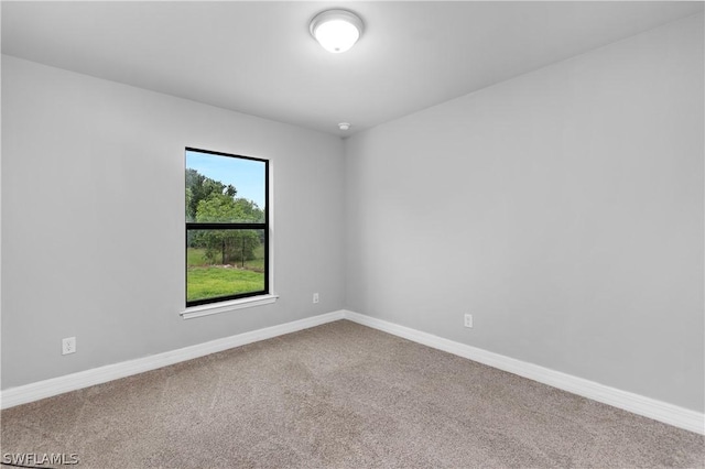 unfurnished room with carpet floors