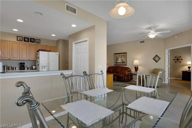 dining area with ceiling fan