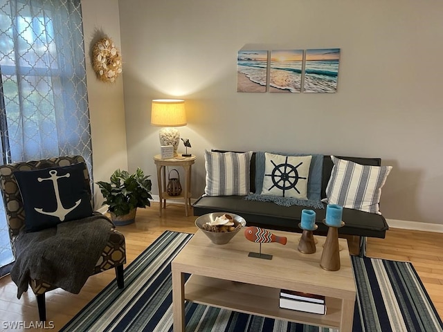 sitting room featuring wood-type flooring