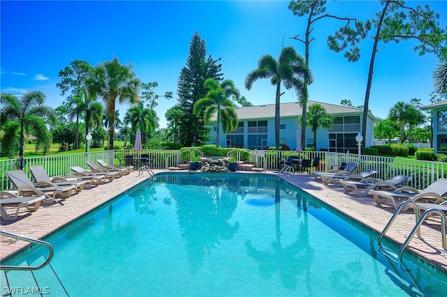 view of pool featuring a patio area