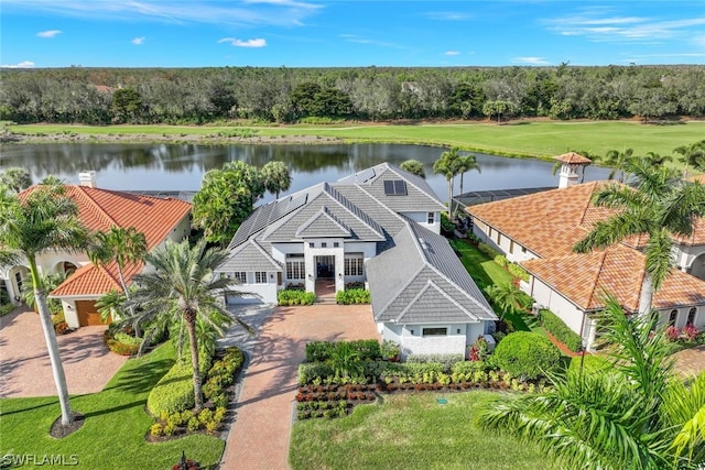 bird's eye view with a water view