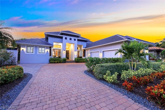 view of front of home with a garage