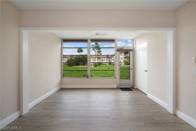 spare room with hardwood / wood-style flooring