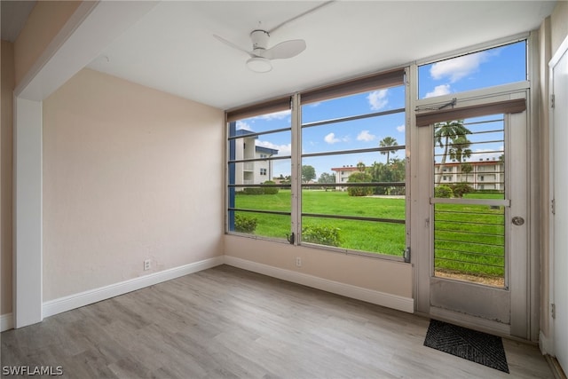 interior space featuring a healthy amount of sunlight and light hardwood / wood-style floors