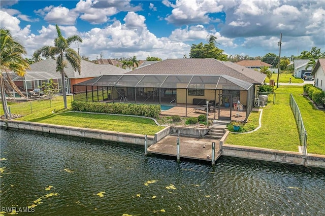 view of dock featuring a pool, a water view, glass enclosure, a patio area, and a yard