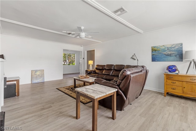 living room with light wood-type flooring and ceiling fan