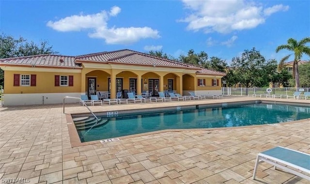 view of pool featuring a patio area