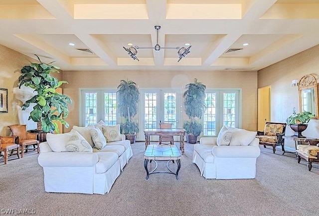 carpeted living room with french doors, a healthy amount of sunlight, and coffered ceiling