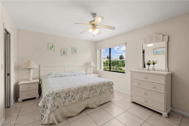 bedroom with light tile patterned floors and ceiling fan