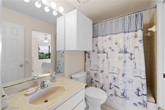 full bathroom featuring vanity, ceiling fan, toilet, and shower / bathtub combination with curtain