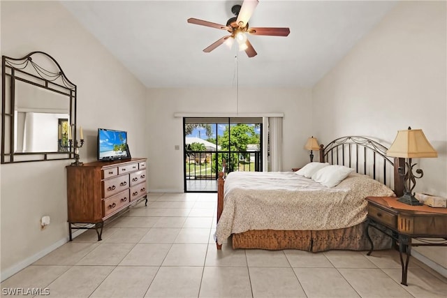 bedroom featuring access to exterior, ceiling fan, and light tile patterned flooring