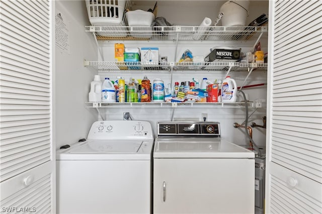 laundry area featuring electric dryer hookup and washer and clothes dryer