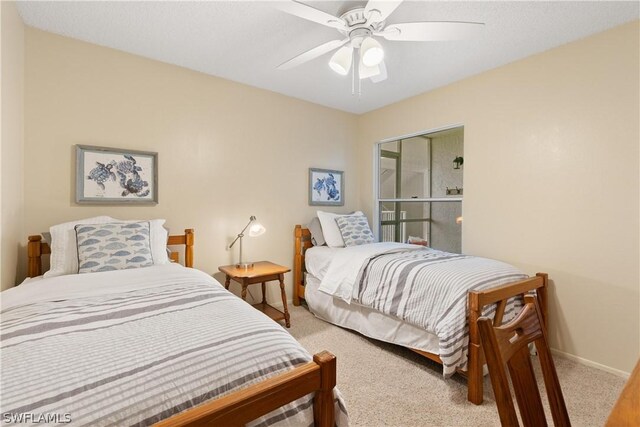 bedroom featuring ceiling fan and carpet floors