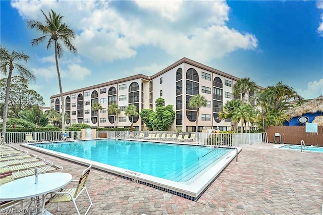 view of swimming pool with a patio area