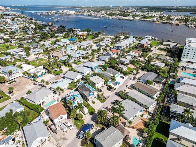 bird's eye view with a water view and a residential view