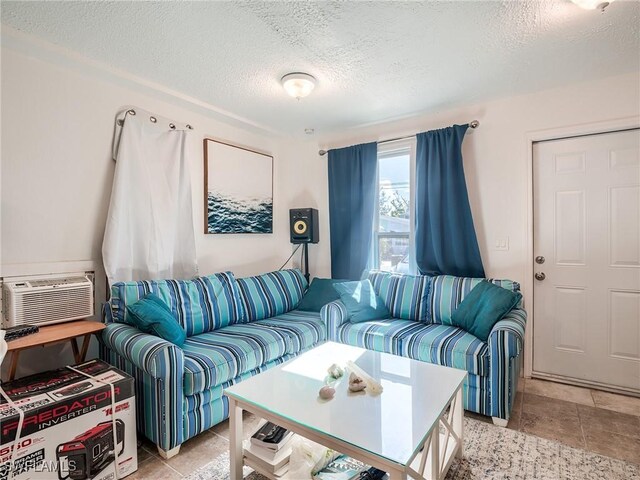 living room with a textured ceiling