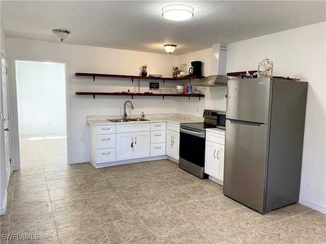 kitchen featuring a sink, open shelves, appliances with stainless steel finishes, and wall chimney range hood