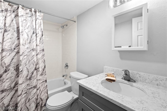 full bathroom with vanity, shower / bathtub combination with curtain, and toilet