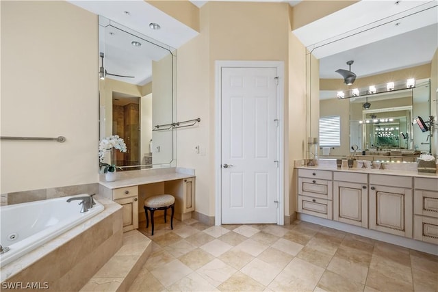 14270 Royal Harbour Ct Unit 1122, Fort Myers, FL 33908 - bathroom with a whirlpool tub, vanity, tile patterned floors, and baseboards