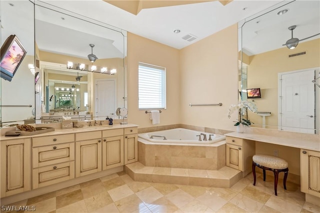 14270 Royal Harbour Ct Unit 1122, Fort Myers, FL 33908 - full bath featuring a whirlpool tub, vanity, and tile patterned floors