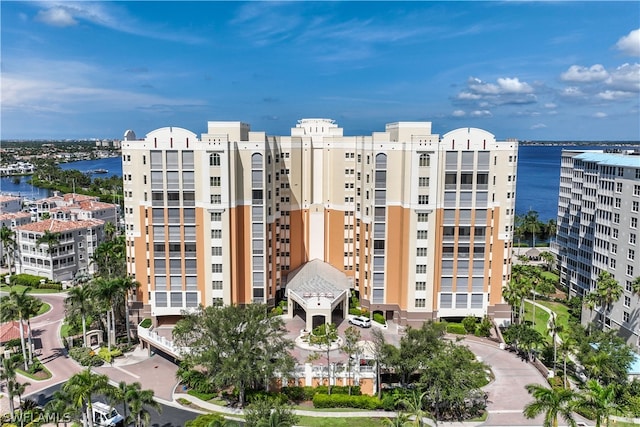 view of building exterior featuring a water view