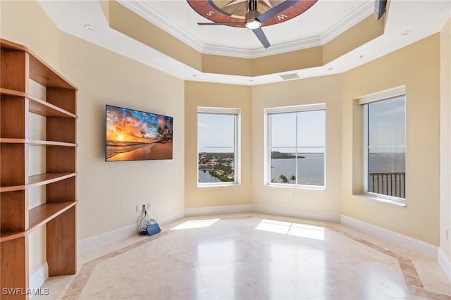 14270 Royal Harbour Ct Unit 1122, Fort Myers, FL 33908 - empty room featuring inlaid floor details, ornamental molding, ceiling fan, a tray ceiling, and baseboards