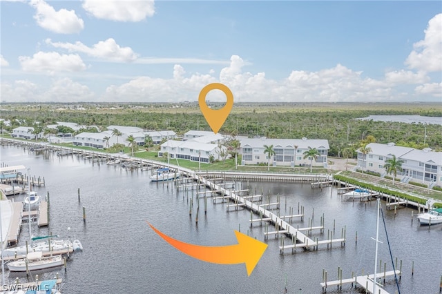 bird's eye view with a water view and a residential view