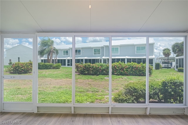 unfurnished sunroom with a healthy amount of sunlight